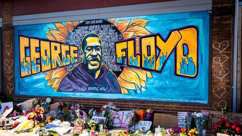 A graffiti tribute to George Floyd, reflecting social awareness and a call for justice.